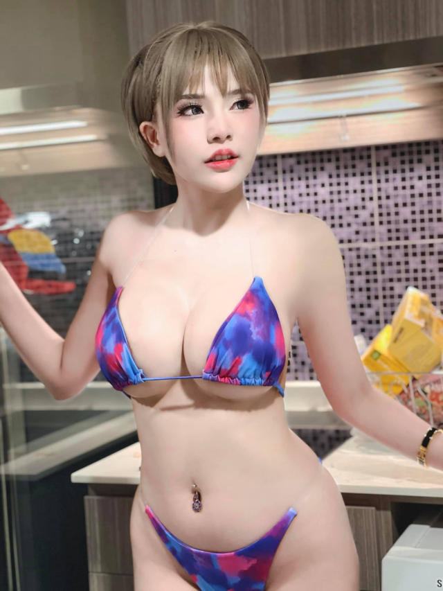 Gái đẹp tóc ngắn bikini Chi Anh xẻ ngực dáng chuẩn